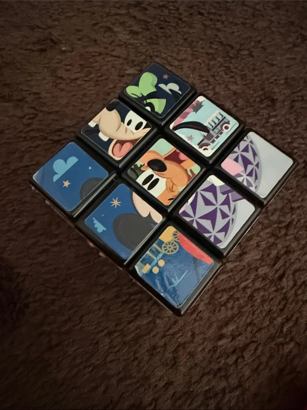 Disney Puzzle Cube with Blue, Purple, Green, Black, White Accents